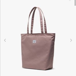 Herschel Pink Totebag brand new with tag. Height 43 cm Width 36 cm, zipper top.